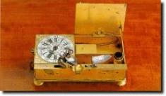 Gilt tinder box alarm clock by Maurer of Berlin, 1750.